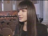 Associated Press: Elena Basescu, 