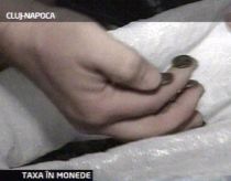 Un clujean si-a platit taxa auto, de 5.000 lei, in monede de 1, 10 si 50 de bani