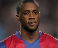 Jucatorii Barcelonei Yaya Toure si Eric Abidal au gripa porcina