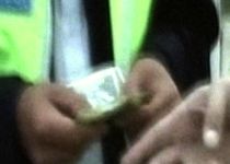 Politist din Alba, prins in flagrant luand mita 500 de lei