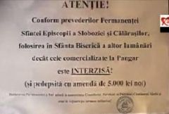 Un preot ameninta cu amenzi daca aprinzi alte lumanari decat cele cumparate din biserica