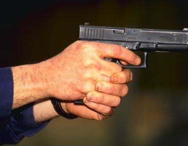 Hot impuscat in cap de politie