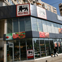 Abuz de drept si tulburare de posesie la Mega Image