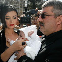 Botez fara fite in familia Prigoana. Mihai Maximus, crestinat cu usile deschise