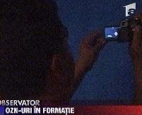 Obiecte luminoase neidentificate, in formatie regulata, filmate la Sibiu