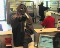 Criminalitatea creste odata cu criza: Din ce in ce mai multe banci jefuite la New York