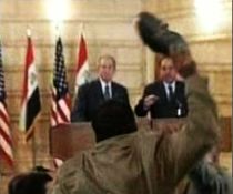 Jurnalistul care a aruncat cu pantofi in Bush va cere azil politic in Elvetia