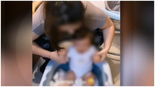 Mama care și-a băgat copilul într-o cadă plină cu zăpadă pentru un clip pe TikTok, cercetată de Poliție